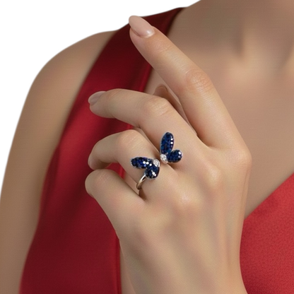 Sapphire Wings RIng in models hand