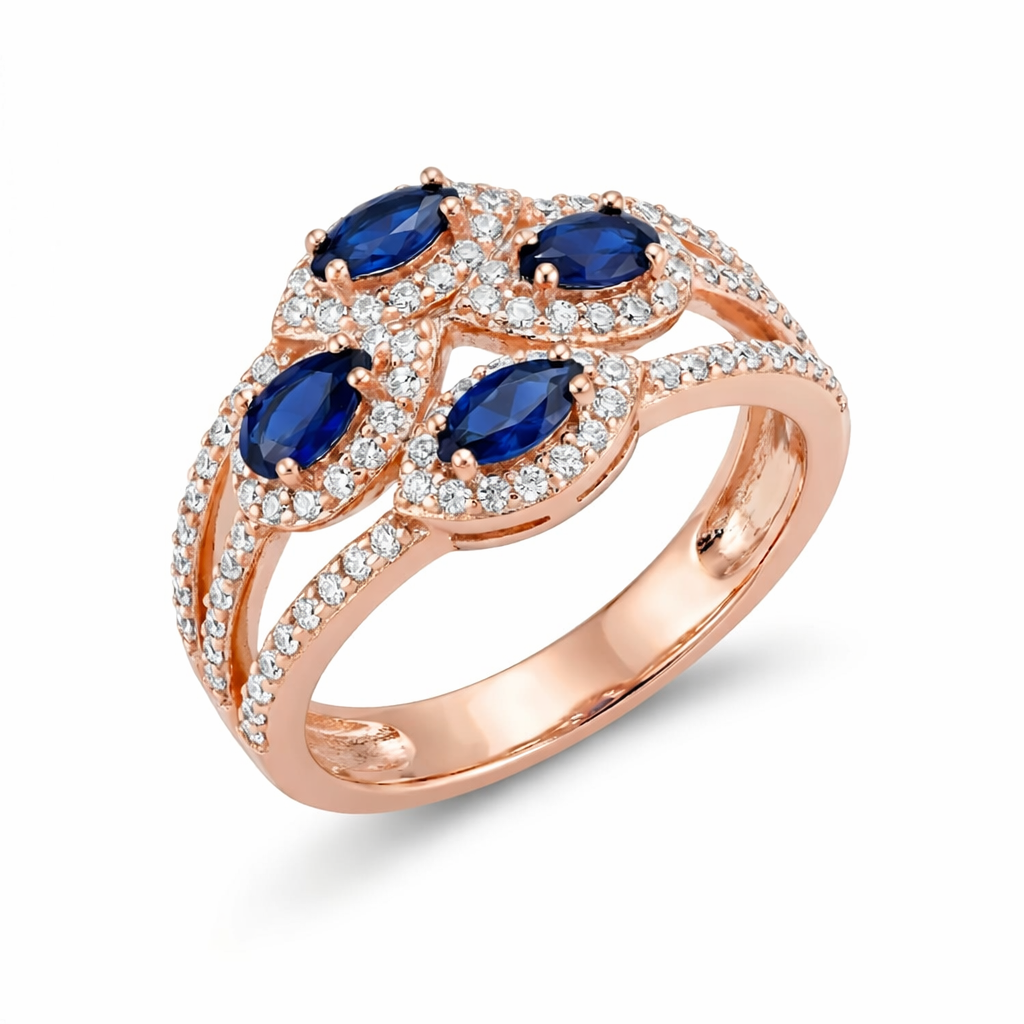 Rose gold ring with blue gemstones and diamonds on a white background
